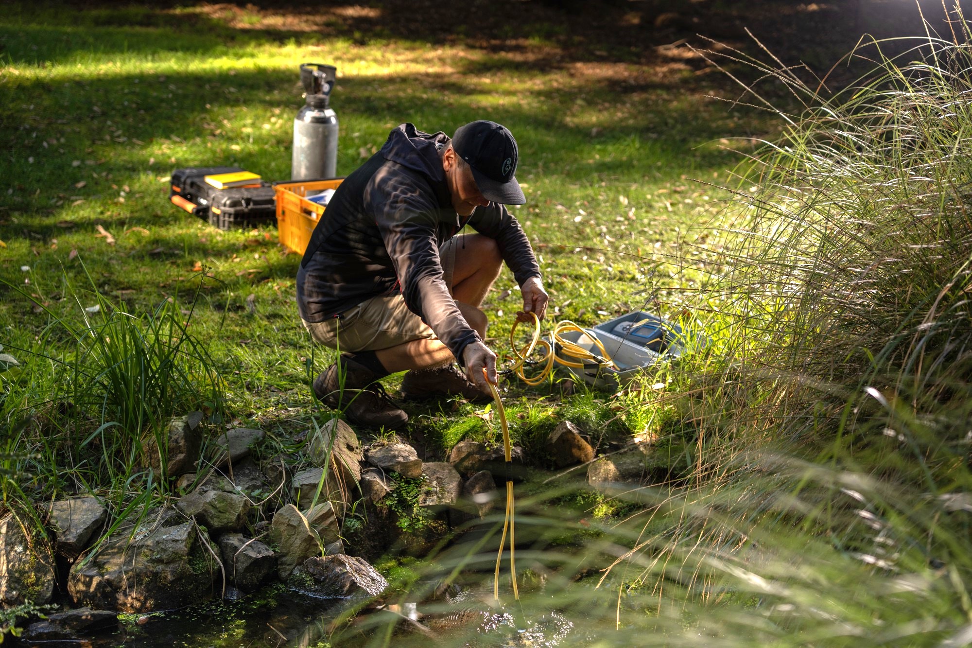 Programme co lead Uwe Morgenstern sampling a spring credit Earth Sciences New Zealand